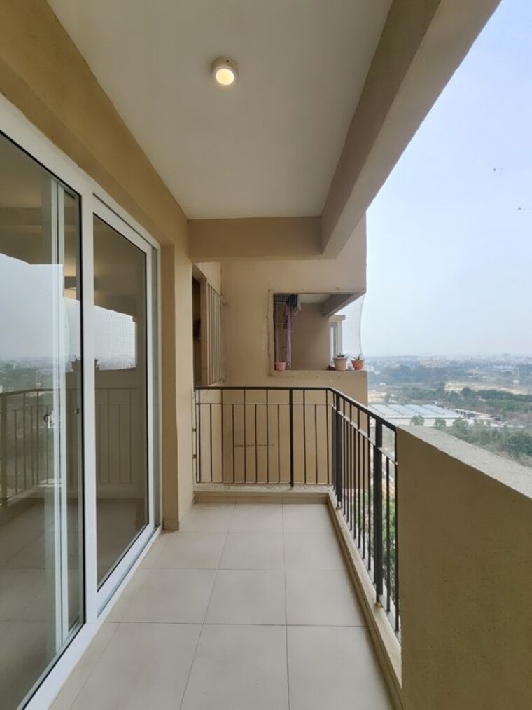 Balcony, bhartiya-city-nikoo-homes-ii 2 Bedroom 936 Sq.Ft. Apartment In Thanisandra Main Road Bangalore 10373400