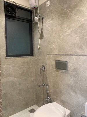 Bathroom in 2 BHK Apartment at Rubberwala Seventh Avenue, Byculla – for Sale