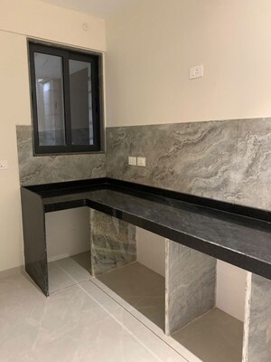 Kitchen in 2 BHK Apartment at Rubberwala Seventh Avenue, Byculla – for Sale