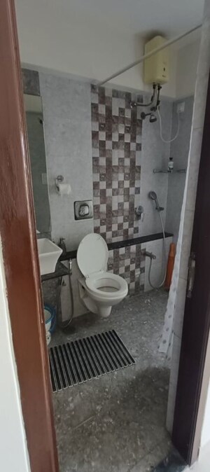 Bathroom in 2 BHK Apartment at Riddhi Tower, Malad East – for Rent