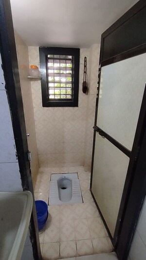 Bathroom in 2 BHK Apartment at Om Surya CHS Dombivli, Dombivli West – for Sale