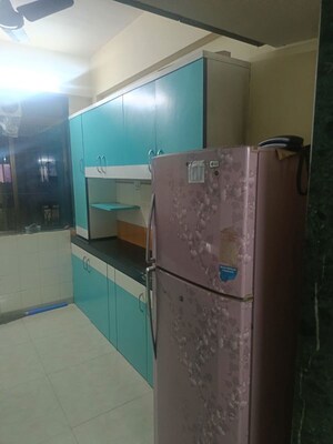 Kitchen in 2 BHK Apartment at Lodha Paradise, Majiwada – for Rent