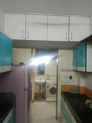 Kitchen in 2 BHK Apartment at Lodha Paradise, Majiwada – for Rent