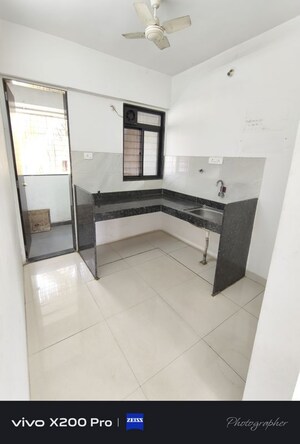 Kitchen in 2 BHK Apartment at Wadgaon Sheri – for Rent