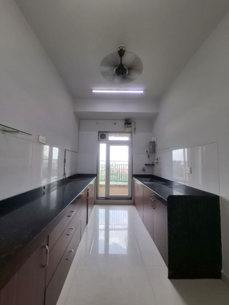 Kitchen, lodha-splendora-phase-ii 2 Bedroom 771 Sq.Ft. Apartment In Ghodbunder Road Thane 10444602
