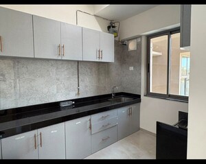 Kitchen in 2 BHK Apartment at Sheth Auris Bliss, Malad West – for Rent