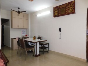 Living Room in 2 BHK Apartment at Amesh CHS, Tilak Nagar – for Sale