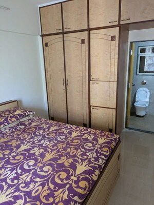 Bedroom in 2 BHK Apartment at Amesh CHS, Tilak Nagar – for Sale