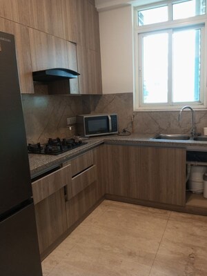 Kitchen in 3 BHK Apartment at Ambience Creacions, Sector 22 – for Rent