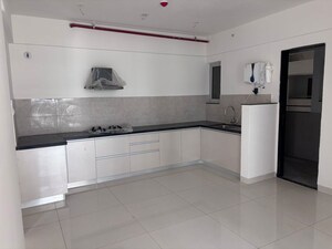 Kitchen in 2 BHK Apartment at Gera Planet Of Joy, Kharadi – for Sale