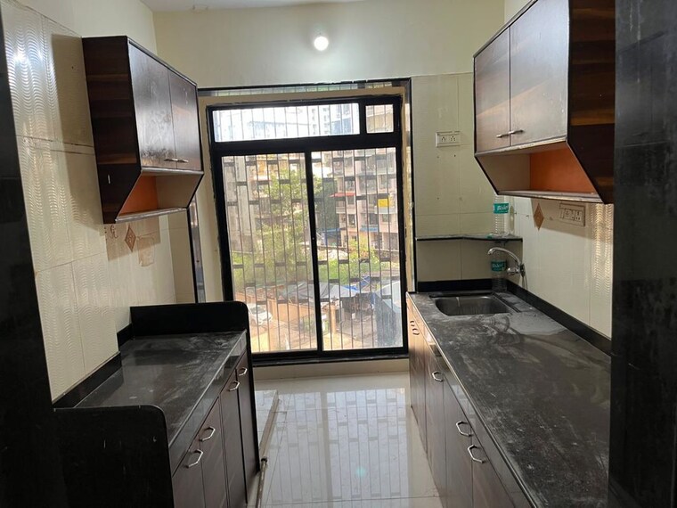 Kitchen, status-vihar 2 Bedroom 1150 Sq.Ft. Apartment In Kharghar Navi Mumbai 10444641