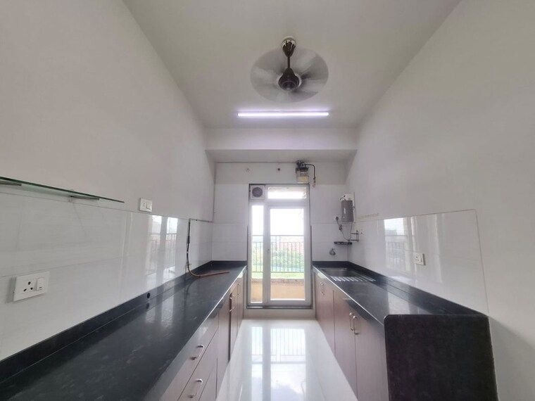 Kitchen, lodha-splendora-phase-ii 2 Bedroom 771 Sq.Ft. Apartment In Ghodbunder Road Thane 10444669