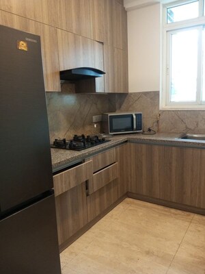 Kitchen in 2 BHK Apartment at Ambience Creacions, Sector 22 – for Rent