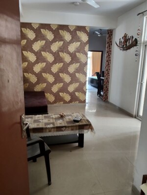Living Room in 2 BHK Apartment at Mahagun My Woods, Sector 16c Greater Noida – for Rent