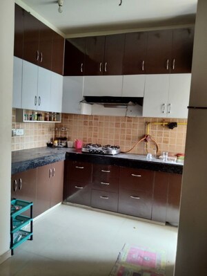 Kitchen in 2 BHK Apartment at Mahagun My Woods, Sector 16c Greater Noida – for Rent