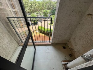 Balcony in 1.5 BHK Apartment at Lodha Lakeshore Greens, Dombivli East – for Rent