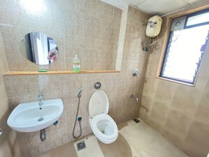 Bathroom in 1.5 BHK Apartment at Lodha Lakeshore Greens, Dombivli East – for Rent