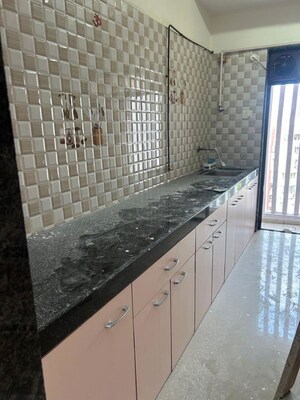 Kitchen in 2 BHK Apartment at Om Sai Charan CHS, Borivali West – for Rent