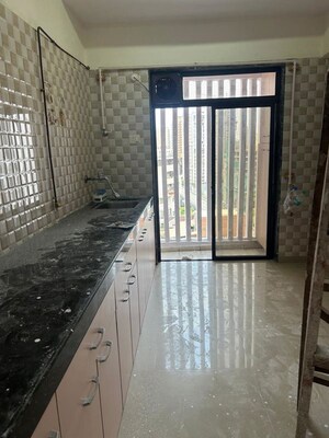 Balcony in 2 BHK Apartment at Om Sai Charan CHS, Borivali West – for Rent