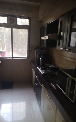 Kitchen in 2 BHK Apartment at Dosti Acres Aster, Wadala East – for Rent