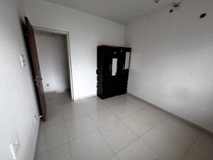 Room in 2 BHK Apartment at Pride Purple Park Titan, Hinjewadi – for Rent
