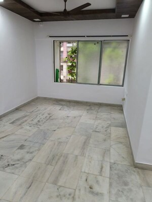 Room in 2 BHK Apartment at Riddhi Gardens CHS, Malad East – for Rent