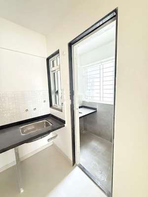 Bathroom in 2 BHK Apartment at Welworth Purnam, Hinjewadi – for Rent
