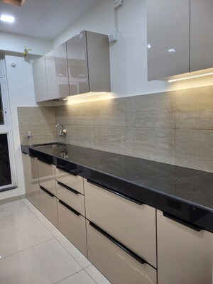 Kitchen in 2 BHK Apartment at Godrej Emerald, Ghodbunder Road – for Rent
