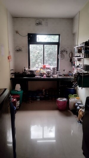 Living Room in 1 BHK Apartment at Ajanta Krupa CHS, Dombivli West – for Sale