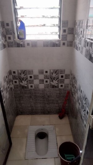 Bathroom in 1 BHK Apartment at Ajanta Krupa CHS, Dombivli West – for Sale
