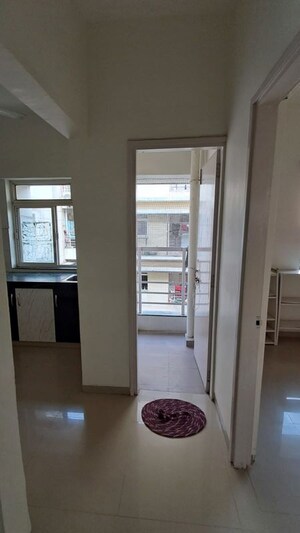 Building Lobby in 2 BHK Apartment at Aavkar Abhilash Apartments, Near Nirma University On Sg Highway – for Rent