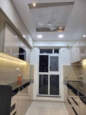 Kitchen in 2 BHK Apartment at Metropolis Rivera, Kasarvadavali – for Rent