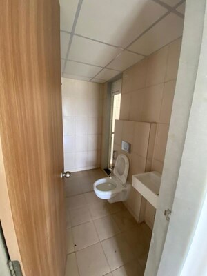 Bathroom in 1 BHK Apartment at Anant Metropolis Insignia Towers, Kasarvadavali – for Rent