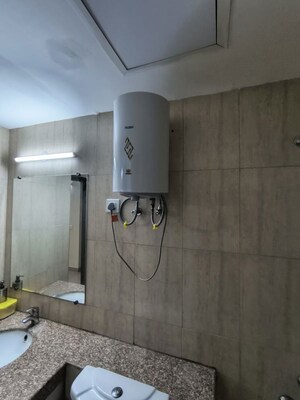 Bathroom in 3 BHK Apartment at Mahagun Moderne, Sector 78 – for Rent