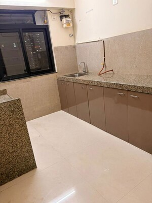 Kitchen in 1 BHK Builder Floor at Parimal CHS Bhandup, Bhandup East – for Sale
