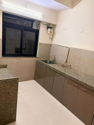 Kitchen in 1 BHK Builder Floor at Parimal CHS Bhandup, Bhandup East – for Sale