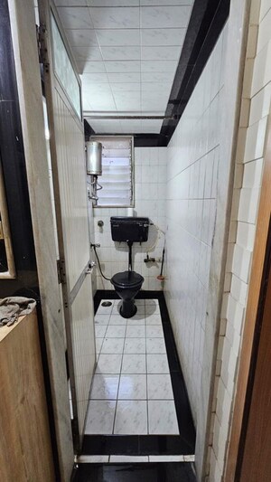 Kitchen in 2 BHK Apartment at Shree Malad Kapole CHS, Malad West – for Rent