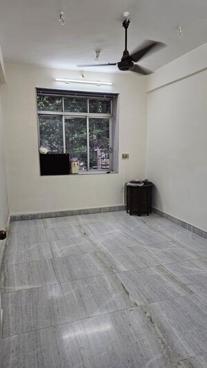 Room in 2 BHK Apartment at Shree Malad Kapole CHS, Malad West – for Rent