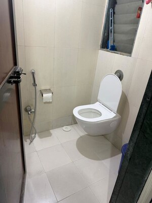 Bathroom in 1 BHK Apartment at Puranik City, Kasarvadavali – for Rent