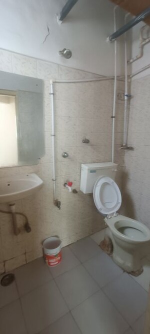 Bathroom in 2.5 BHK Apartment at Kopar Khairane – for Rent