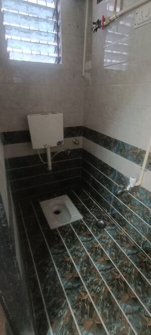 Bathroom in 2.5 BHK Apartment at Kopar Khairane – for Rent