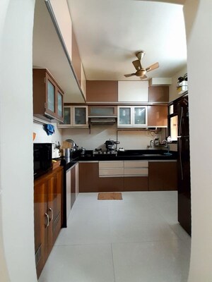 Kitchen in 2 BHK Apartment at Cosmos Jewels, Ghodbunder Road – for Sale