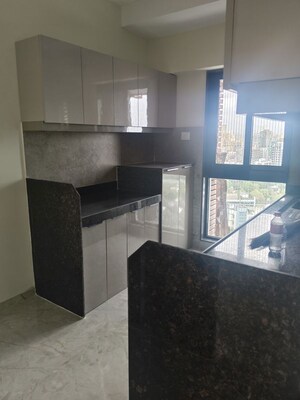 Kitchen in 1 BHK Apartment at Ajmera Boulevard, Malad West – for Rent