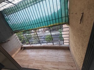 Balcony in 3 BHK Apartment at Sangharsh CHS, Nerul Sector 25 – for Rent