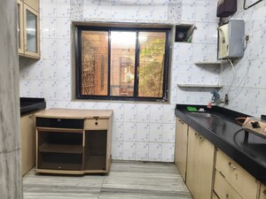 Kitchen in 2 BHK Apartment at Rajendra Apartments Malad, Malad West – for Rent