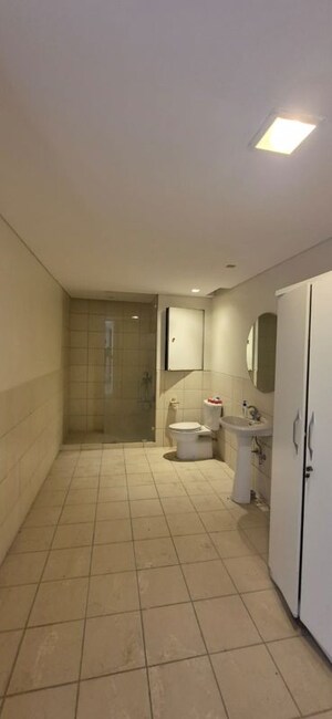Bathroom in 4 BHK Apartment at Panchshil One North, Magarpatta City – for Sale