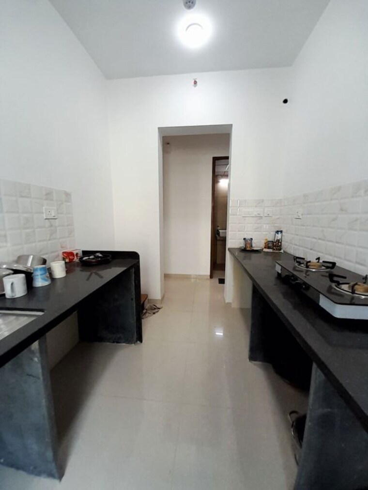 Kitchen, kalpataru-immensa 2 Bedroom 590 Sq.Ft. Apartment In Kolshet Road Thane 10445707