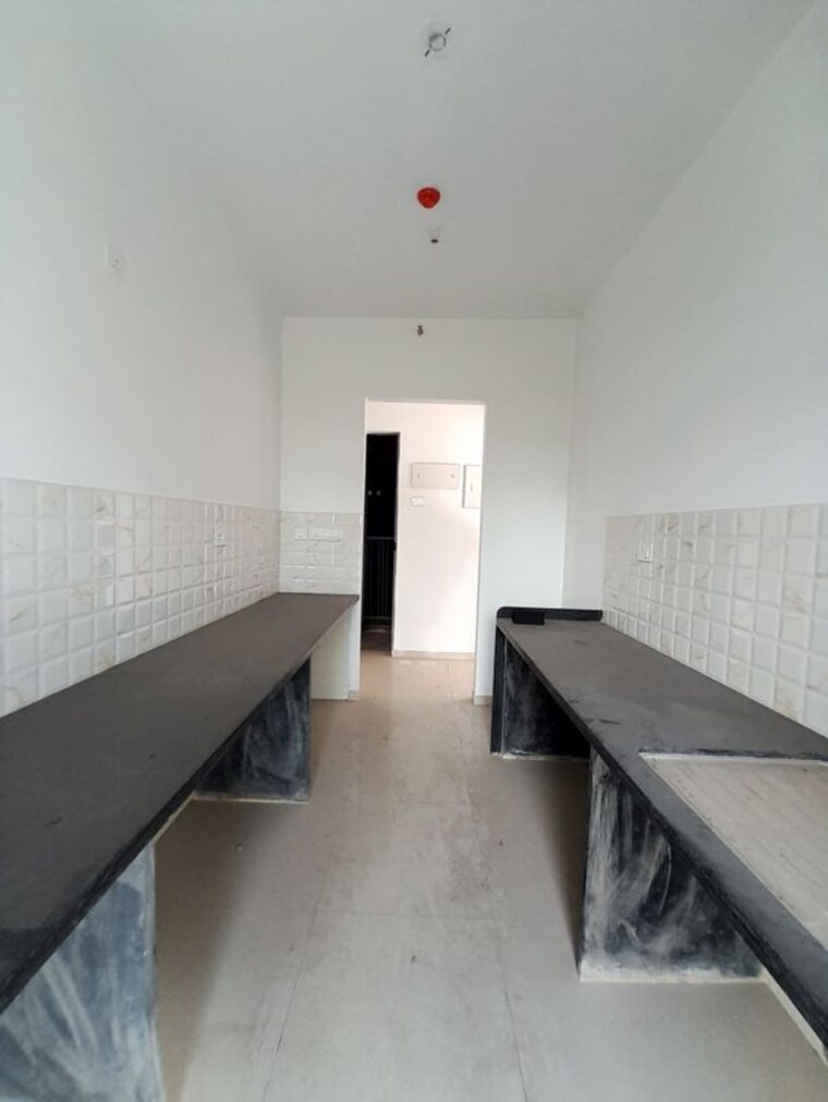 Kitchen, kalpataru-immensa 2 Bedroom 808 Sq.Ft. Apartment In Kolshet Road Thane 10445732