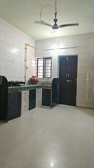 Kitchen in 2 BHK Apartment at Makarba – for Rent