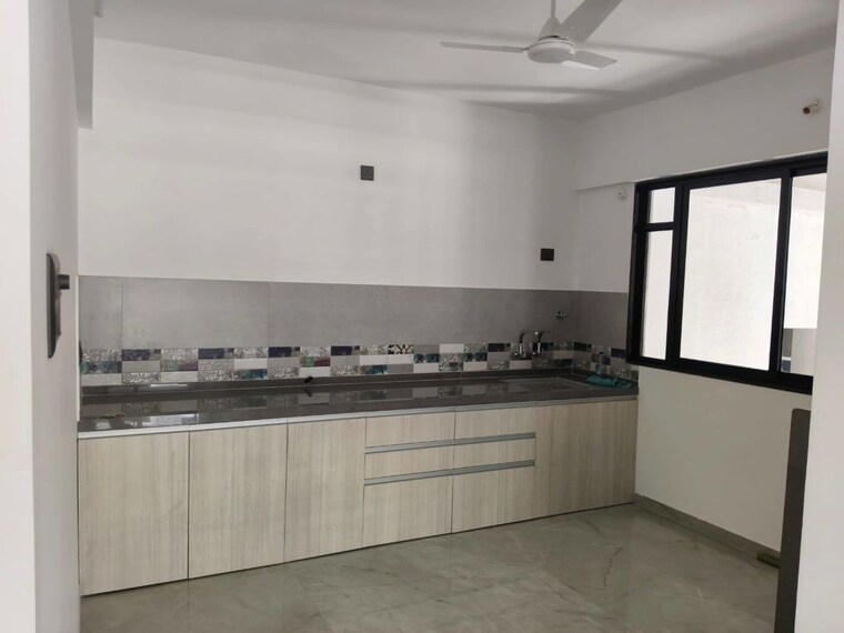 Kitchen, unique-youtopia 2 Bedroom 730 Sq.Ft. Apartment In Kharadi Pune 10445979